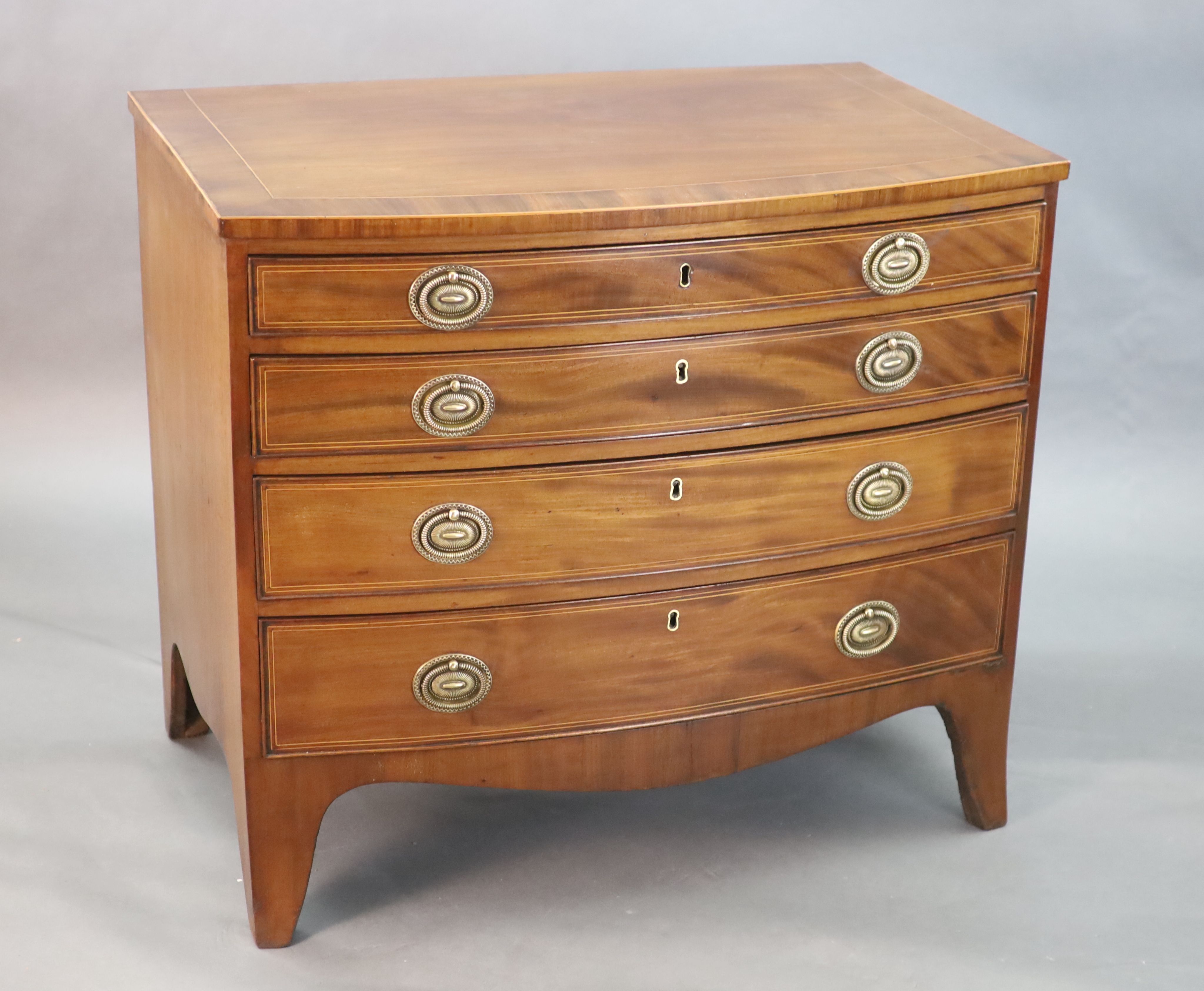 A Regency crossbanded mahogany bowfront chest, W.2ft 10in. D.1ft 10in. H.2ft 6in.